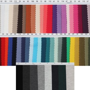 May include: A swatch card with 36 fabric samples in various colors, including black, white, red, blue, green, and brown. The swatches are numbered with corresponding numbers printed above each sample.