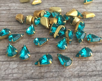 Blue Zircon 10x6mm bezeled pear shape rhinestones in brass settings, 12 pieces BV-0923