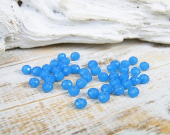 50 faceted glass beads medium blue 4 x 3 mm