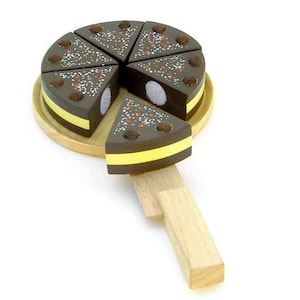 Chocolate cake for cutting, wooden toy