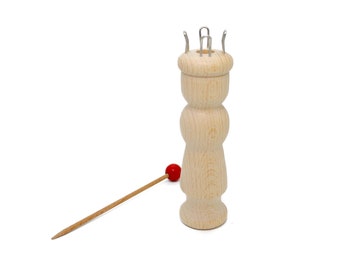 4 hook knitting toys made of natural wood.