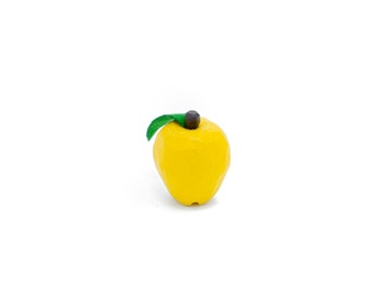 yellow apple hand-carved