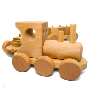 Wooden train with wooden sheet and cube trailer