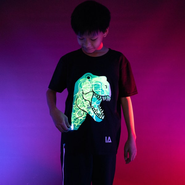 T-shirt interattiva per bambini con dinosauri che si illumina al buio - Divertente per le feste di compleanno