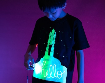 Illuminated Apparel Childrens Interactive Glow T-shirt - Rocket Blast Off