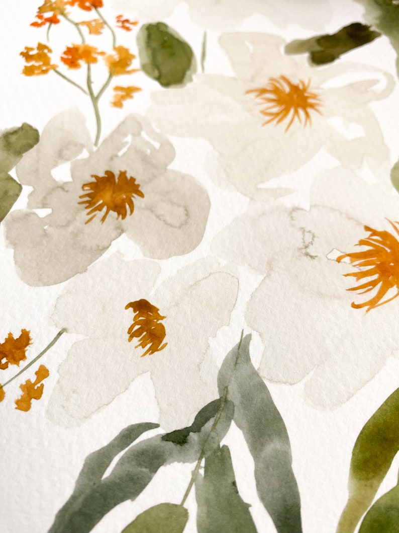May include: Watercolor painting of white flowers with brown centers and green leaves. The flowers have a soft, blurred appearance, with delicate brushstrokes. Orange and brown accents add contrast to the composition. The artwork is on a white background.