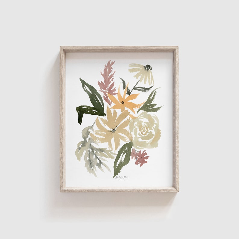 May include: A framed watercolor painting of a bouquet of flowers in shades of yellow, green, and pink. The flowers are painted in a loose, abstract style.