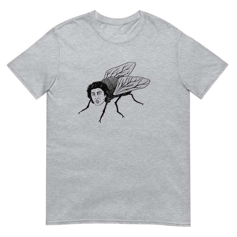 May include: A gray t-shirt with a black and white illustration of a fly with a human face.