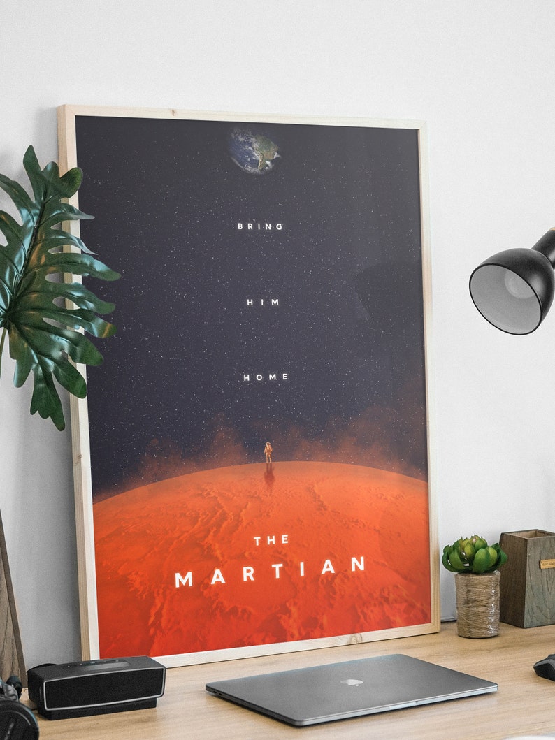May include: A minimalist poster with a dark blue background and a red planet with a small figure of an astronaut standing on it. The text "Bring Him Home" is written in white above the planet and "The Martian" is written in white below the planet.