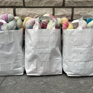 Deichschaf*s wool bags filled with hand-dyed sock yarn, skeins in 4ply/6ply/8ply