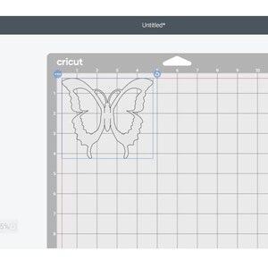 May include: A Cricut Design Space screen displays a butterfly outline on a cutting mat. The software interface shows options for "Score" and "Basic Cut" operations. The mat size is set to 12 x 12 inches.
