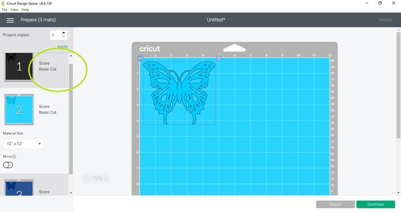 Peut inclure: Un motif de papillon bleu sur un tapis bleu clair dans le logiciel Cricut Design Space. Le motif est pr&ecirc;t &agrave; &ecirc;tre d&eacute;coup&eacute; sur une machine Cricut.