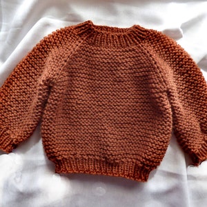 Knitting Pattern The Mere baby pullover top-down. Sizes: 0-3 3-6 6-12 12-24 months. Download PDF in English image 1