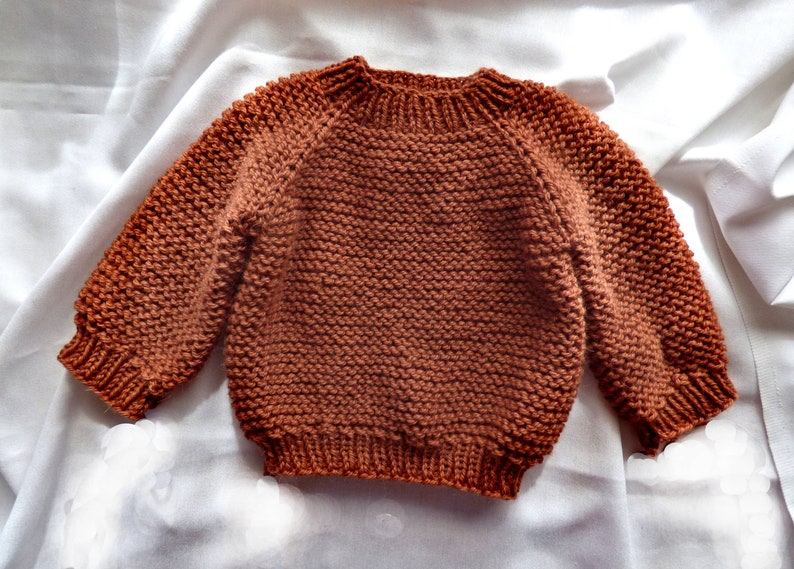 Knitting Pattern The Mere baby pullover top-down. Sizes: 0-3 3-6 6-12 12-24 months. Download PDF in English image 1