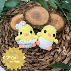 May include: A PDF crochet pattern for two yellow chicks wearing colorful outfits. The pattern is titled "No Sew PDF Crochet Pattern".