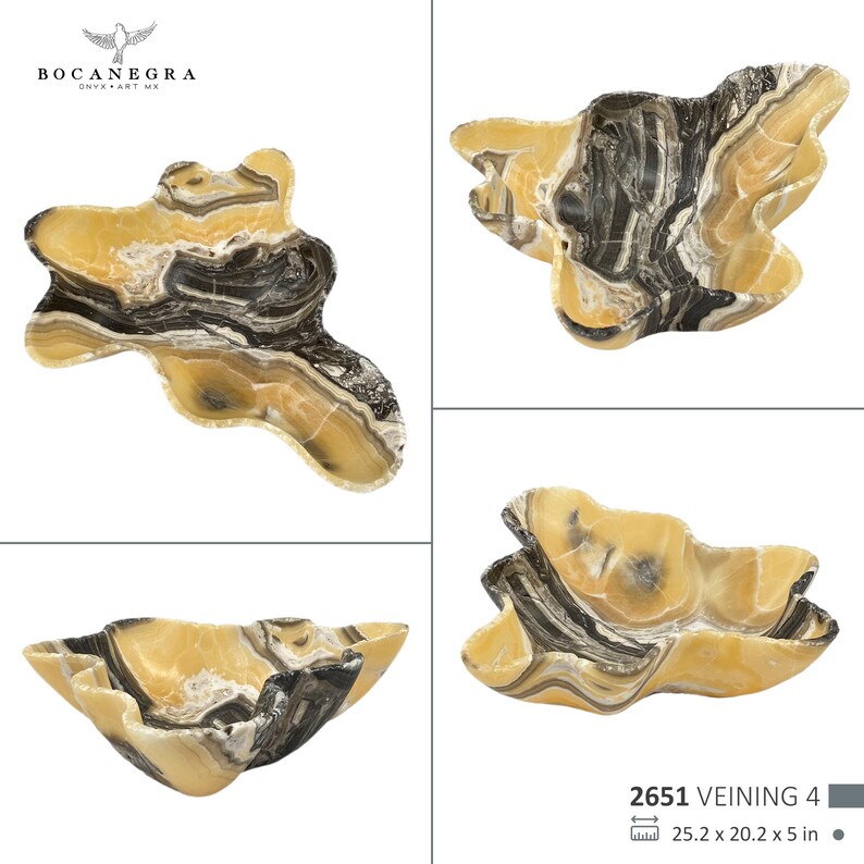 May include: Four views of a decorative onyx bowl with a unique, organic shape. The bowl features a blend of yellow, black, and white veining. The dimensions are 25.2 x 20.2 x 5 inches. The brand logo is visible in the top left corner.