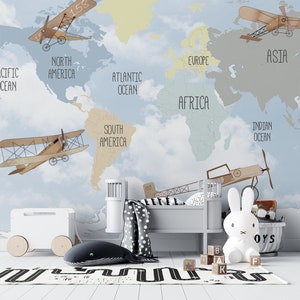 Rétro / Vintage / Avion / Carte du monde / Nuages / Ciel / Papier peint intissé / Respectueux de l'environnement