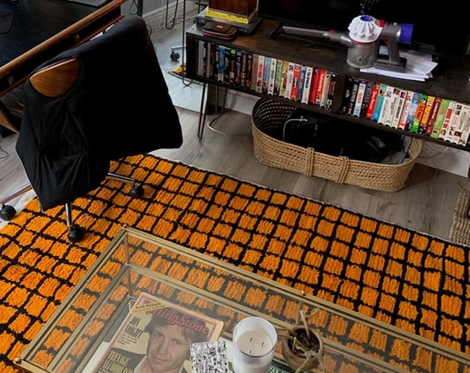 Moroccan Grid rug: Black and orange berber checkered area rug!