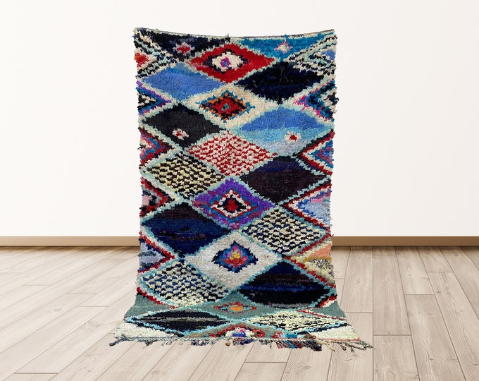 7x4 Vintage Boucherouite rug: Moroccan Berber rug.