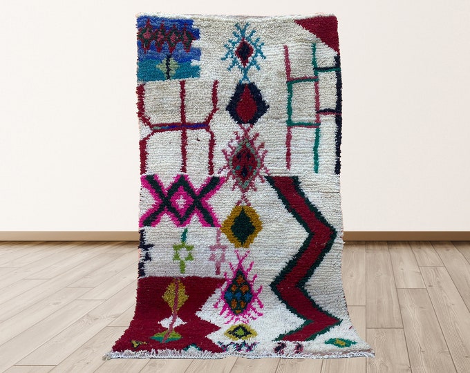 Handwoven Moroccan Wool Area Rug: Berber Creative Design.