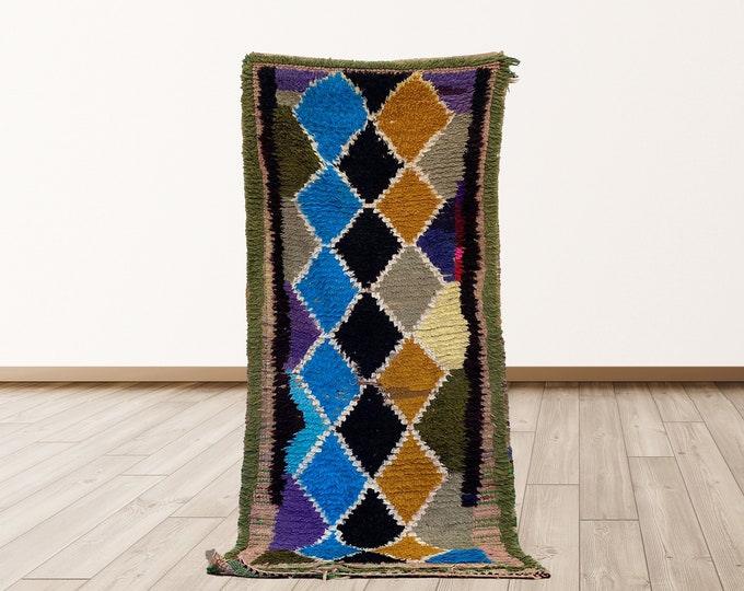 Woven vintage Berber Azilal Moroccan 3x7 ft rug.