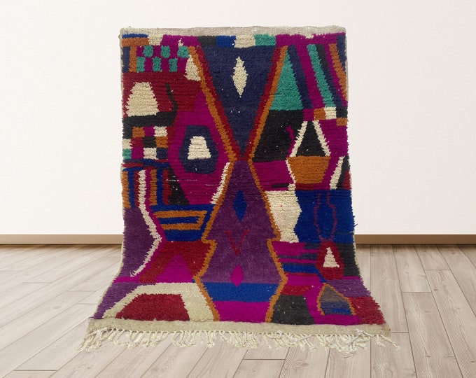 Handwoven Moroccan Wool Area Rug with a Colorful Dreative Design.