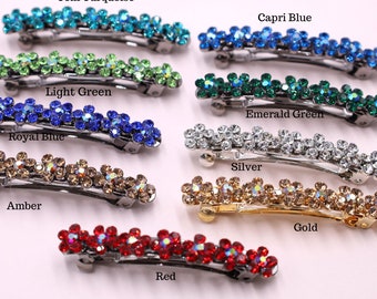 Puede incluir: Diez pinzas para el pelo con diferentes colores de piedras de imitación. Los colores son turquesa, verde claro, azul real, ámbar, rojo, azul capri, verde esmeralda, plata y oro.