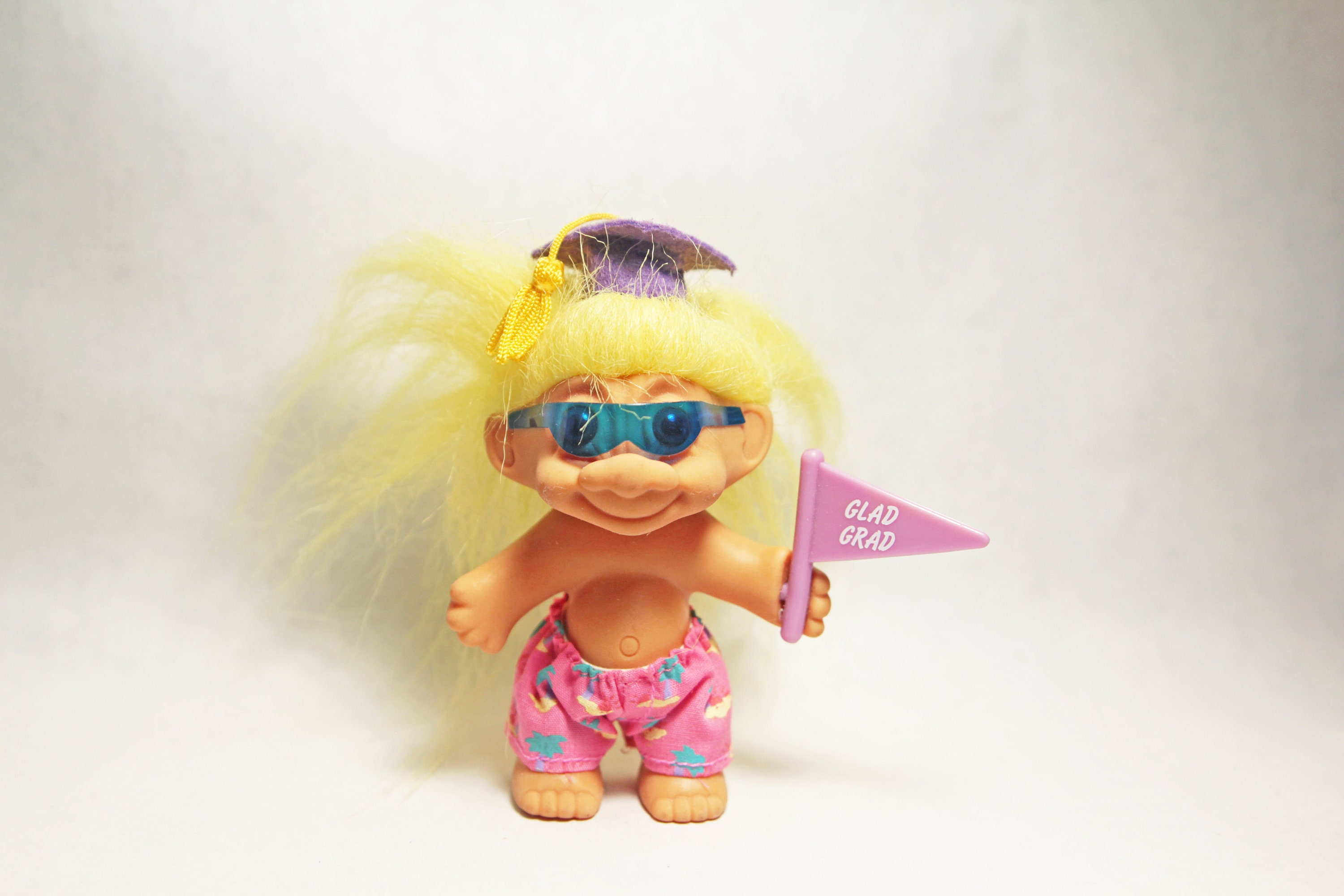 troll doll with glasses