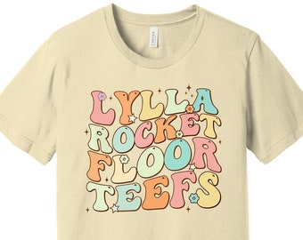 Camiseta Guardianes de la Galaxia Vol 3 / Lylla Rocket Teefs and Floor / Lote 89 / Fuente Retro Groovy Style