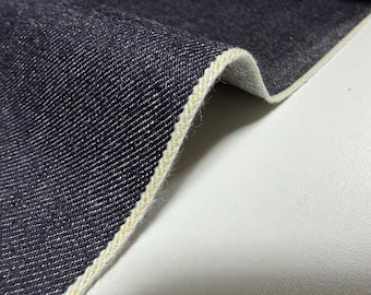 12,3 oz (ca. 349 g) schwerer japanischer Indigo-Denimstoff mit hellrosa Webkante, Meterware.