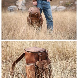 May include: A brown leather backpack with multiple compartments and adjustable straps. The backpack has a top flap closure and side pockets. The bag is made of a distressed leather material, giving it a vintage look. The backpack is designed for carrying items and is suitable for travel or everyday use.
