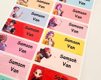 May include: A sheet of rectangular stickers with colorful backgrounds and illustrations of animated characters. Each sticker has the name "Samson Van" printed in black. The backgrounds are various colors, including pink, yellow, and red.