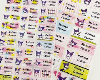 May include: Sheet of personalized name labels featuring the name "Melissa Connor" in various colors and designs. Each label includes a cartoon character. The labels are rectangular and have a glossy finish.