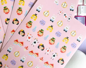 May include: Three sheets of pink sticker paper with various Alice in Wonderland themed stickers. The stickers include a white rabbit, a pocket watch, a playing card, a mushroom, a cat, a queen, a mad hatter, and a bottle.