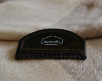 Bobble off , easy cashmere and wool comb