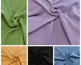 Lyoncell viscose uni 140 wide, softly falling in black, purple, ocher yellow, jeans blue, green