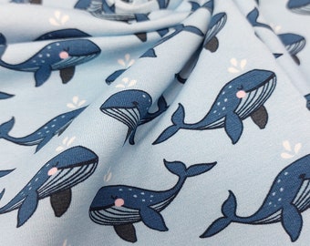 Cotton jersey 145 cm wide whales in dark blue on a light blue Oeko-Tex background