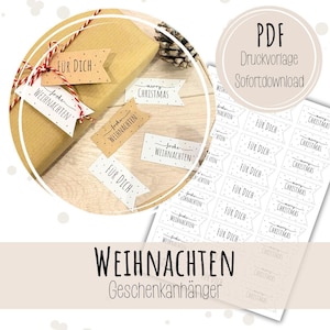 Könnte beinhalten: Weihnachtsgeschenkanhänger mit Aufschriften wie "Merry Christmas" und "Für Dich" liegen neben einem Geschenk. Die Anhänger sind in Weiß und Braun gehalten, mit schwarzem Text und Punktmustern. Ein Bogen mit druckbaren Anhängern ist ebenfalls zu sehen, mit dem Text "PDF Druckvorlage Sofortdownload".