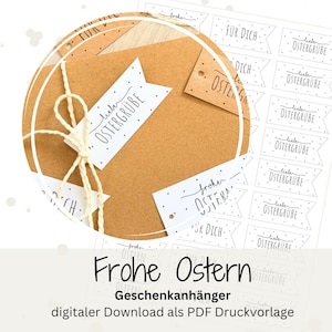 以下が含まれることがあります： イースターギフトタグとラベルのコレクション。タグは白で、黒い文字で「liebe OSTERGRÜBE」と「Frohe Ostern」と書かれています。ラベルは茶色で白い文字です。画像にはクラフト紙の背景とひもも含まれています。