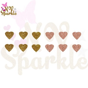 Peut inclure: Un ensemble de 10 cœurs pailletés, 5 dorés et 5 or rose. Les cœurs sont disposés en deux rangées de cinq. Les cœurs sont sur un fond blanc avec le texte "NY Sparkle" en rose et blanc.