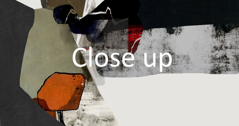 May include: Abstract art print with a mix of colors including black, white, gray, red, orange, and blue. The print has a textured look and the words "Close up" are printed in white.