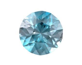 May include: A round, faceted, light blue gemstone with a clear center.