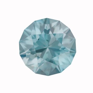 May include: A light blue gemstone with a faceted cut. The gemstone is round and has a high polish.