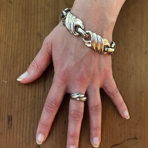 Vintage-Schmuckset. Set (Kettenarmband und Armreif) in Silber, signiert von David Grau. Retro-Stil.