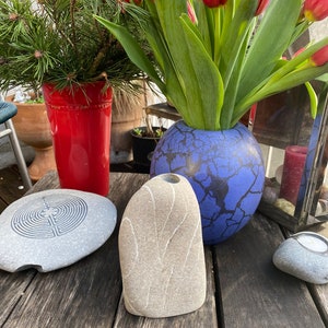Flower vase cut from stone