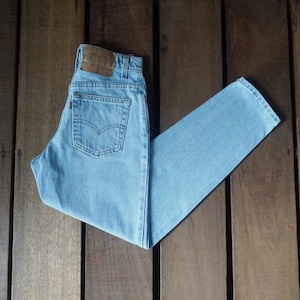 90s Vintage Levi&#39;s 551 Jeans: High Waist Relaxed Fit, Light Blue Wash W25