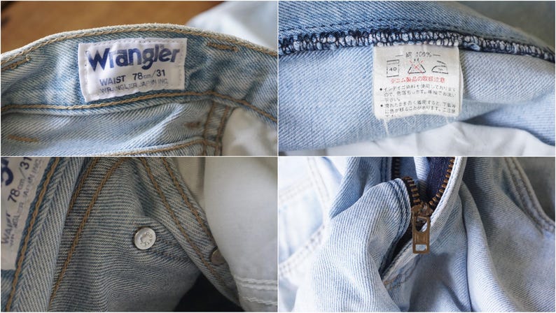 May include: Close-up of light blue denim jeans. The Wrangler label shows a waist size of 78/31. Details include a metal zipper, a button closure, and a care label with Japanese text.