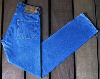 90s Vintage Levi's 501 Jeans: High Waist Light Blue Denim, Made in USA (W27)