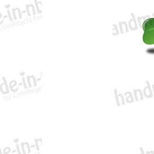 May include: A white card with green four-leaf clovers and the text "Gl&uuml;ck ist... eine Putzfee wie Dich zu haben!" in black cursive writing. A red heart is in the bottom right corner.