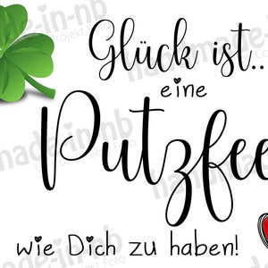 May include: A white background with a green four-leaf clover and black text that reads "Gl&uuml;ck ist... eine Putzfee wie Dich zu haben!"